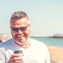 Steve enjoying a coffee on Brighton beach