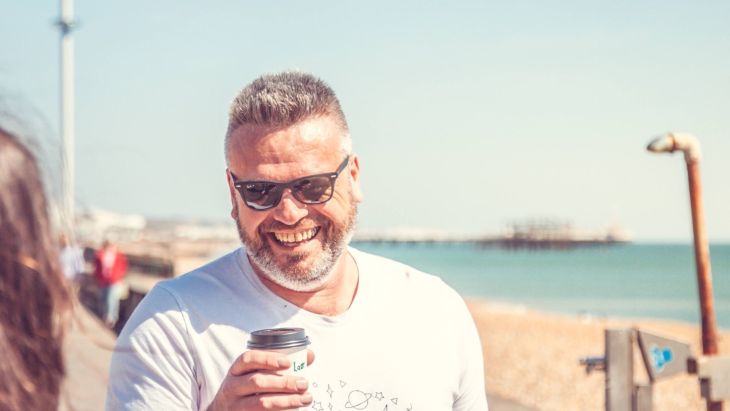 Steve enjoying a coffee on Brighton beach