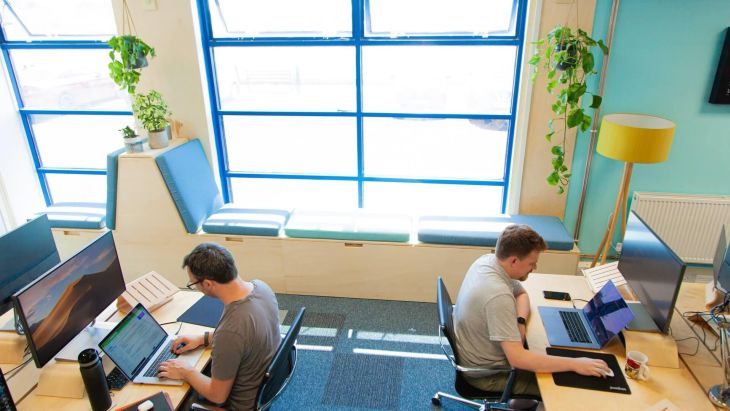 Alistair and Rob at their desks in the new studio