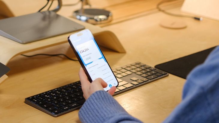 A user checking her mobile device for a push notification