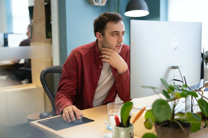 Jotham Oakley working at his desk