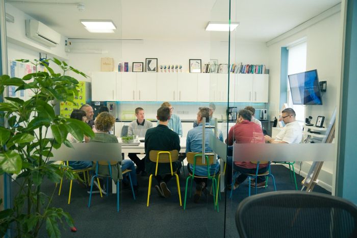 The Brightec team sitting around the kitchen table