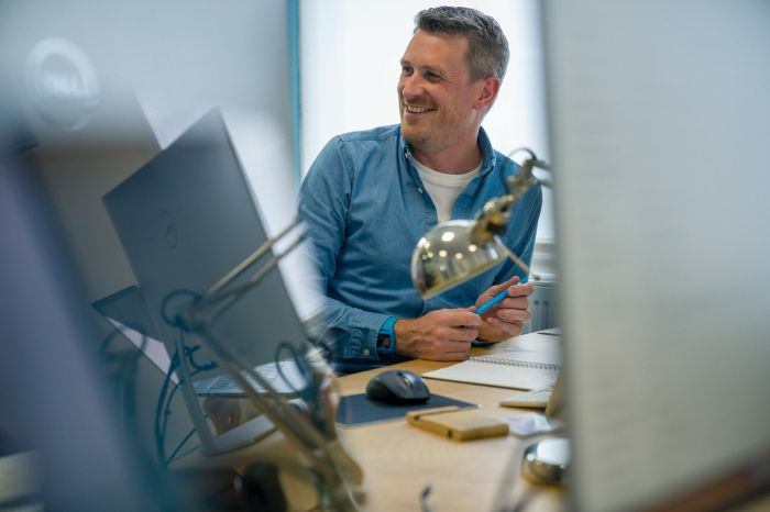 Andy Ferrett working at the Brightec office