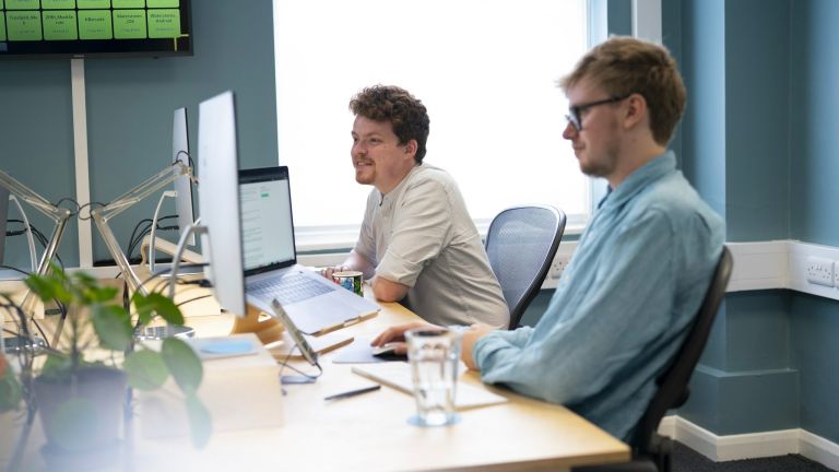 Alistair and Rhys at a computer