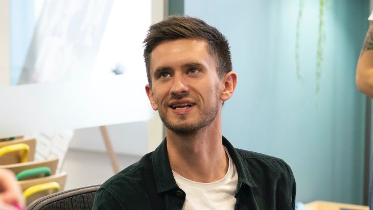 Jonny at his desk