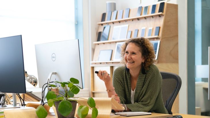 Caz at her desk