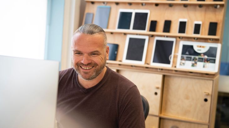 Steve working at his desk