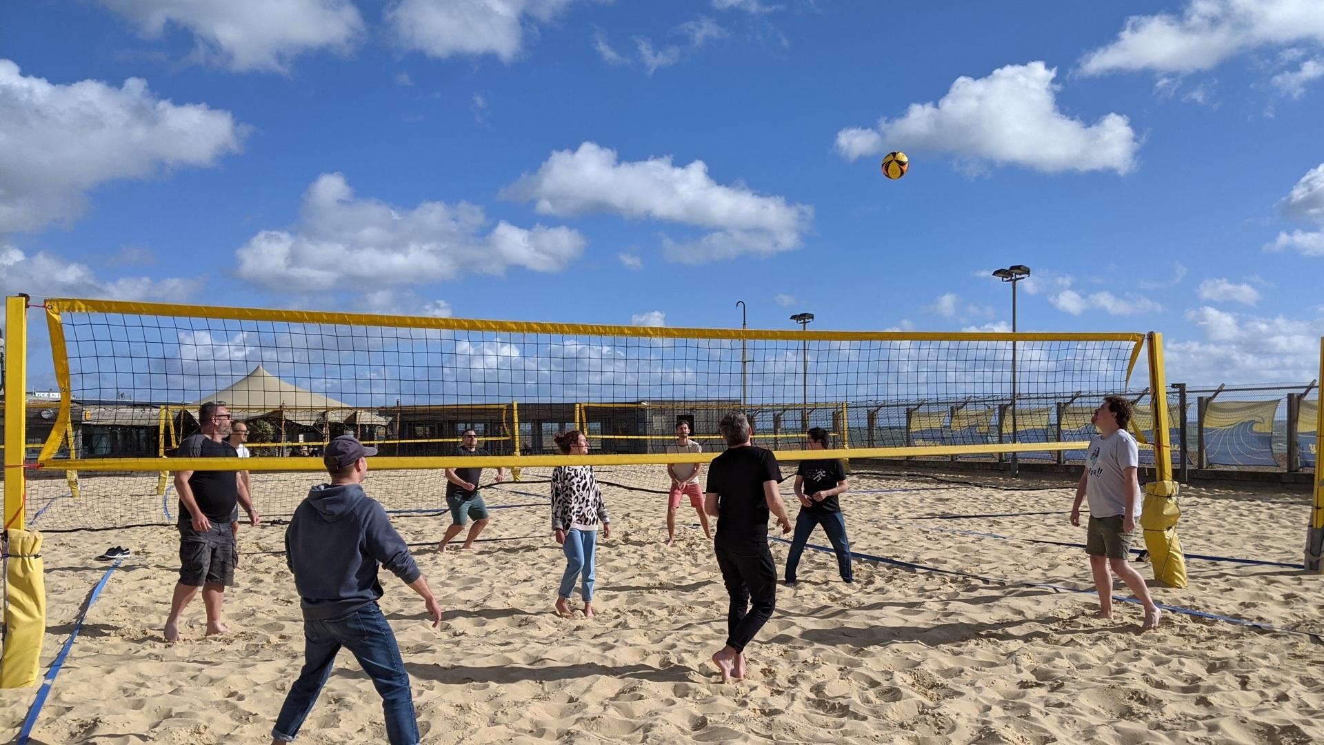 The Brightec team playing volleyball