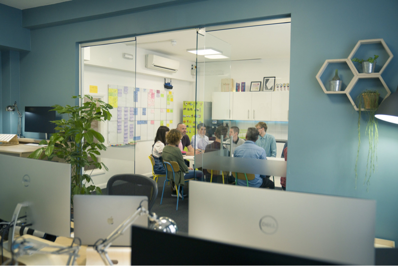 brightec team gathered around the kitchen table